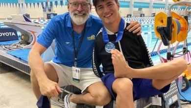 Photo of Abbas Karimi, a disabled swimmer, won a silver medal in the world championships.